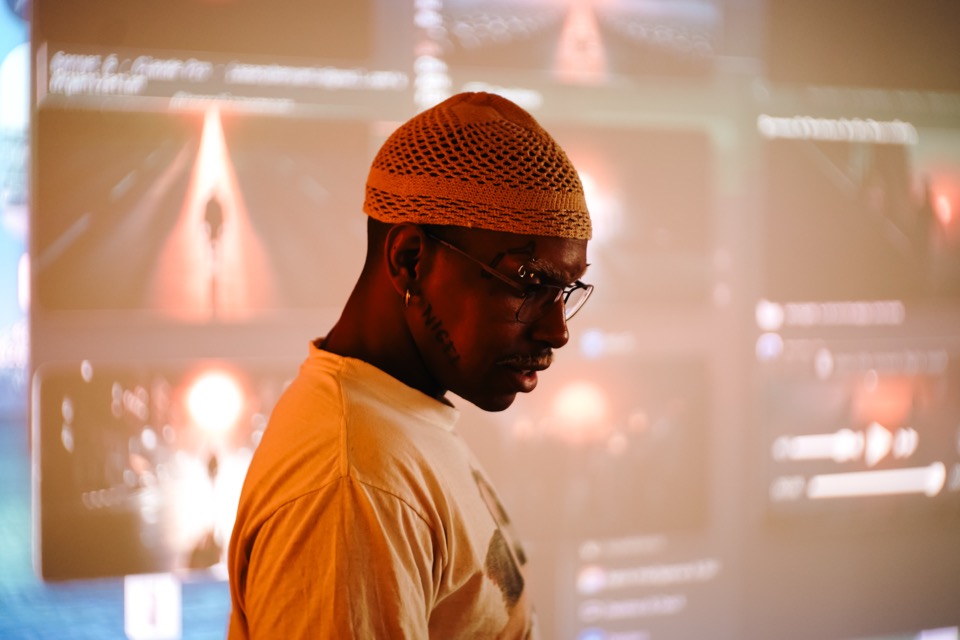 An attendee concentrating on their build during a Light School workshop
